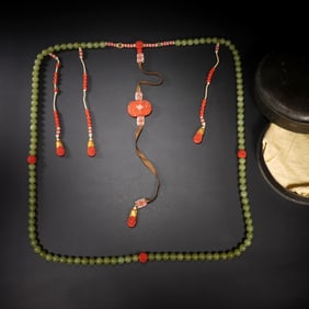 A CHINESE IMPERIAL YELLOW JADE PRAYER BEADS CHAOZHU
