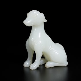 A FINE CARVED WHITE JADE HOUND