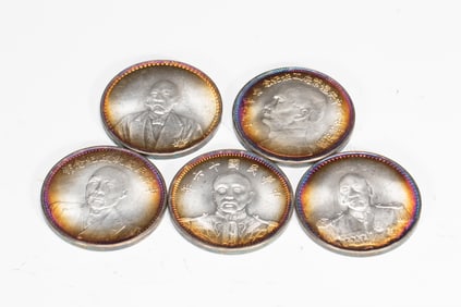 A COLLECTION OF FIVE COINS