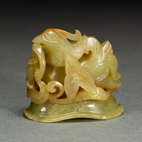 A CARVED YELLOW JADE MANDARINE DUCK HAT FINIAL