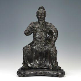 A CARVED ROSEWOOD ZITAN SEATED GUANDI