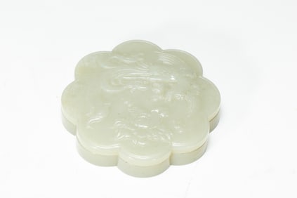 A CARVED WHITE JADE BOX WITH COVER