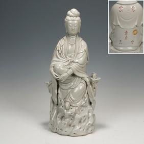 A BLANC-DE-CHINE SEATED GUANYIN