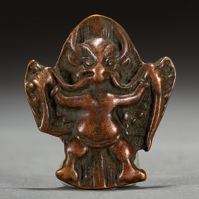 A TIBETAN GARUDA AMULET