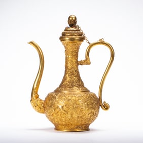 A BRONZE-GILT EWER