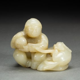A CARVED WHITE JADE FOREIGNER HUREN