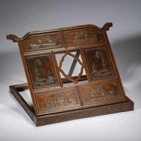 A CARVED HUANGHUALI MIRROR