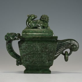 A CARVED SPINACH GREEN JADE TEAPOT
