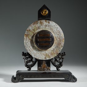 AN ARCHAISTIC JADE CIRCULAR DISC HUAN