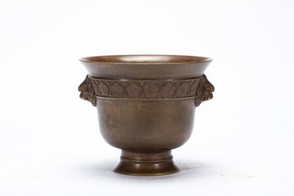 A BRONZE CENSER WITH HANDLES