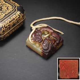 A CARVED YELLOW JADE CHILONG SEAL