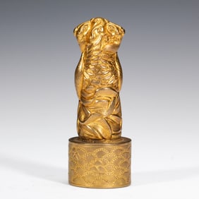 A BRONZE-GILT SEAL