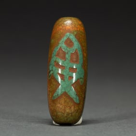 A TIBETAN DZI BEAD
