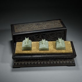 A SET OF THREE CARVED JADE DRAGON SEALS