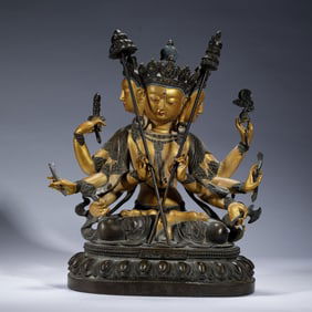 A SINO-TIBETAN BRONZE SEATED SITAPATRA