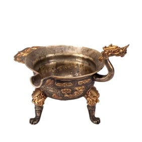 A BRONZE PARTLY GILT DRAGON EWER