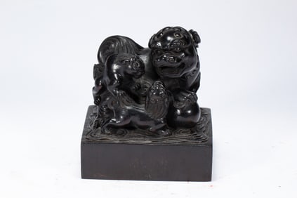 A CARVED ROSEWOOD ZITAN LIONS SEAL