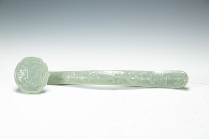 A CARVED WHITE JADE RUYI SCEPTER