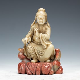 A CARVED SHOUSHAN STONE GUANDI