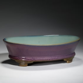 A PURPLE SPLASHED JUN-WARE JARDINIERE