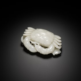 A CARVED WHITE JADE CRAB
