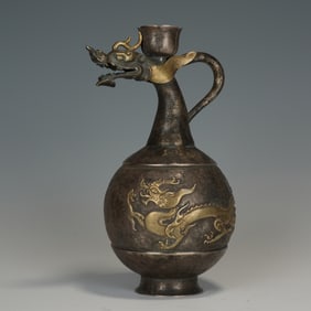 A SILVER PARTLY GILT DRAGON EWER