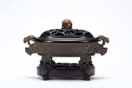 A BRONZE CHILONG CENSER