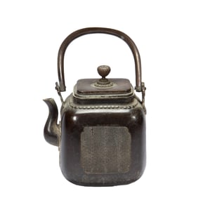 A BRONZE TEAPOT