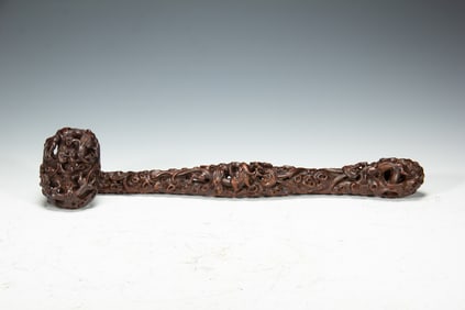 A CARVED ANNATTO-WOOD RUYI SCEPTER