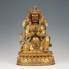 A BRONZE-GILT BODHISATTVA