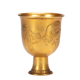 A BRONZE-GILT RAMS CUP