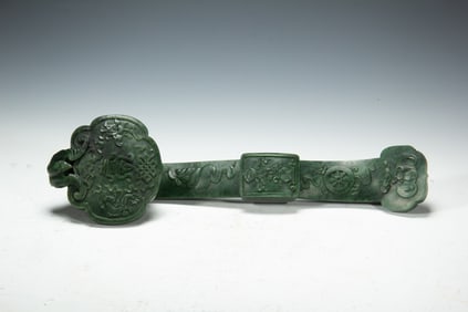 A CARVED SPINACH GREEN JADE RUYI SCEPTER