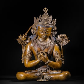 A FINE AND RARE COPPER ALLOY FIGURE OF MANJUSRI
