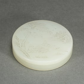 AN INCISED WHITE JADE BOX WITH COVER