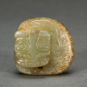 A CARVED JADE MYTHICAL BEAST