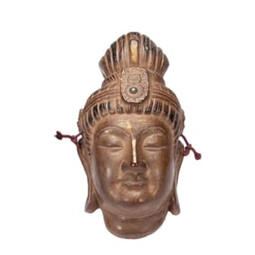 A BRONZE BODHISATTVA HEAD