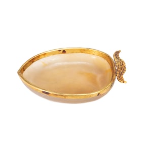 A CARVED AGATE WASHER