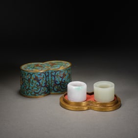 A COLLECTION OF WHITE JADE AND JADEITE ARCHER RINGS