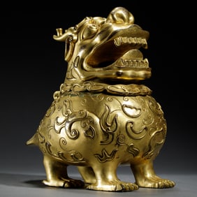 A BRONZE-GILT MYTHICAL BEAST LUDUAN