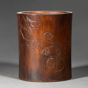 A CARVED HUANGHUALI BRUSHPOT