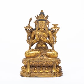 A BRONZE-GILT FIGURE OF MANJUSRI