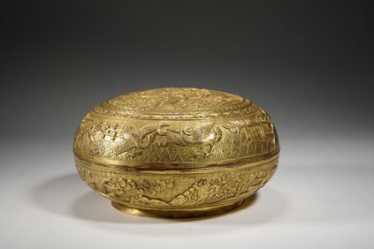 A BRONZE-GILT CIRCULAR BOX WITH COVER