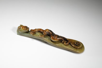 A CARVED JADE CHILONG BELTHOOK