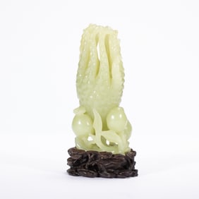 A FINE CARVED YELLOW JADE FINGERED CITRON