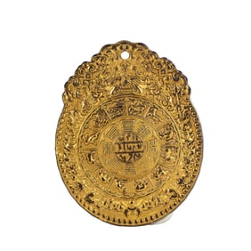 A TIBETAN BRONZE-GILT PLAQUE