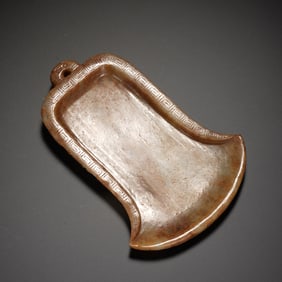 A CARVED YELLOW JADE INKWELL