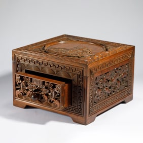 A CARVED HUANGHUALI TREASURE BOX