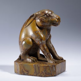 A CARVED SHOUSHAN STONE RABBIT