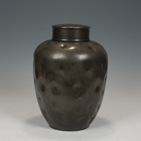 A TIN TEA CADDY WITH COVER