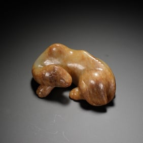 A CARVED YELLOW JADE CAMEL
